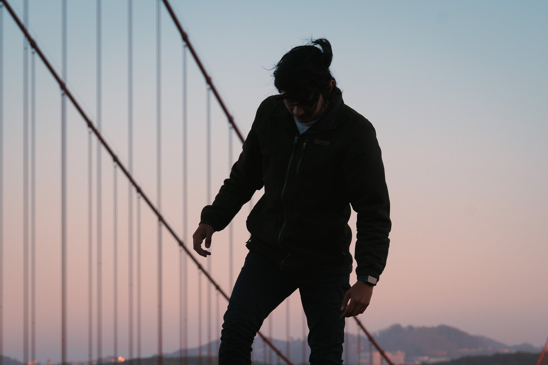 The Golden Gate Bridge cables in silhouette